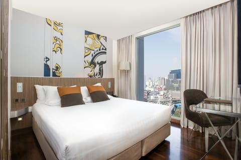 Superior Room, 1 King Bed, City View | Minibar, in-room safe, desk, laptop workspace