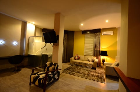 Suite, 1 Bedroom | Living area | Flat-screen TV