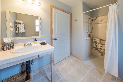 King Cottage ADA Accessible | Bathroom | Shower, free toiletries, hair dryer, bathrobes