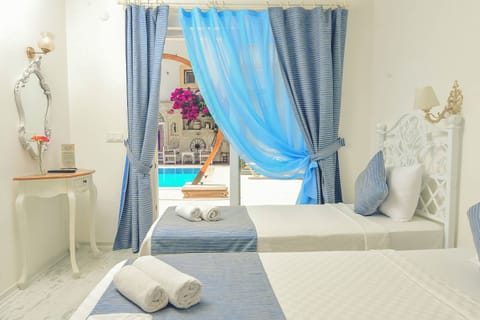 Comfort Triple Room, Pool View | Premium bedding, minibar, in-room safe, desk