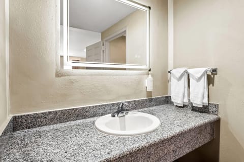 Standard Room, 2 Queen Beds | Bathroom | Combined shower/tub, free toiletries, hair dryer, towels