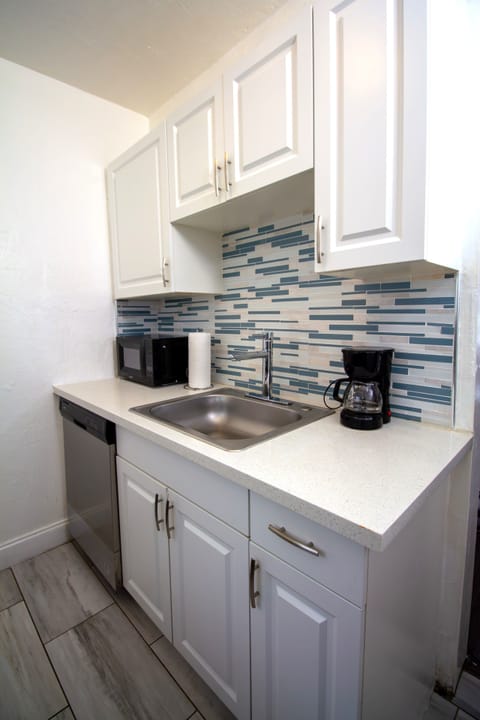 Classic Apartment, 3 Bedrooms | Private kitchen | Full-size fridge, microwave, stovetop, dishwasher