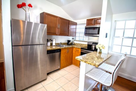 Comfort Apartment, 2 Bedrooms | Private kitchen | Full-size fridge, microwave, stovetop, dishwasher