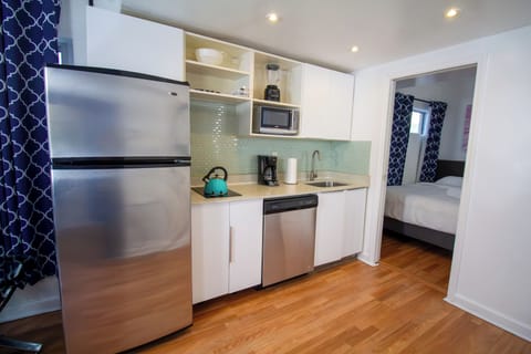 Apartment, 1 Bedroom | Private kitchen | Full-size fridge, microwave, stovetop, coffee/tea maker