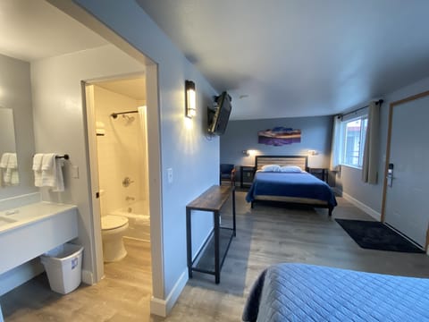 Room, 2 Queen Beds | Bathroom | Shower, free toiletries, towels