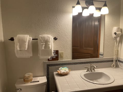 Suite, 1 King Bed, Jetted Tub, Ocean View | Bathroom | Free toiletries, hair dryer, towels