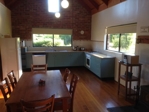 Cottage, 2 Bedrooms | Private kitchen | Full-size fridge, microwave, oven, stovetop