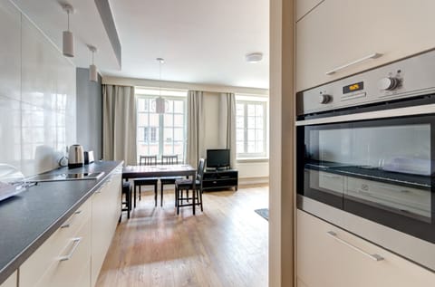 Apartment, 2 Bedrooms, City View (6 Adults) | Private kitchenette | Fridge, microwave, stovetop, dishwasher