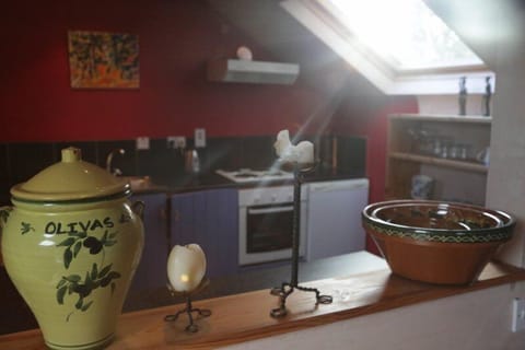 Fridge, stovetop, electric kettle, cookware/dishes/utensils