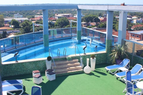 Outdoor pool, open 8 AM to 9 PM, sun loungers