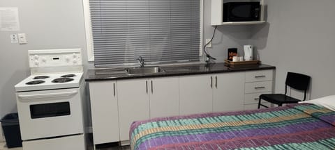 Deluxe Room, 2 Queen Beds, Non Smoking, Kitchenette | Desk, free WiFi, bed sheets