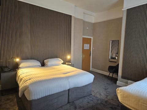 Triple Room | Hypo-allergenic bedding, desk, laptop workspace, blackout drapes