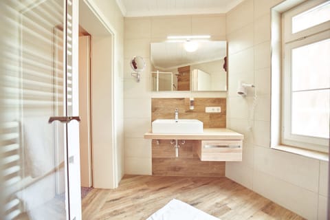 Quadruple Room | Bathroom | Hair dryer, towels