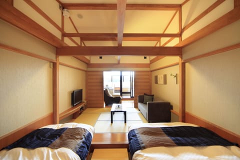 Japanese Western Style Room with Japanese Futon and Private Open-air Bath, City View | In-room safe, desk, iron/ironing board