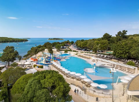 2 outdoor pools, open 9 AM to 7 PM, pool umbrellas, sun loungers