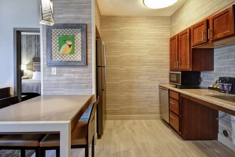 Suite, 1 King Bed, Accessible, Bathtub (Mobility & Hearing) | Private kitchen | Full-size fridge, microwave, stovetop, dishwasher