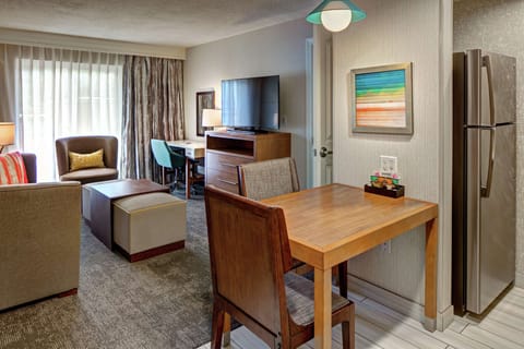 Suite, 1 Bedroom | Living area | 48-inch TV with cable channels, iPod dock, MP3 dock