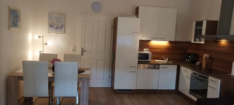 Comfort Apartment, Balcony | Private kitchen | Full-size fridge, microwave, stovetop, dishwasher