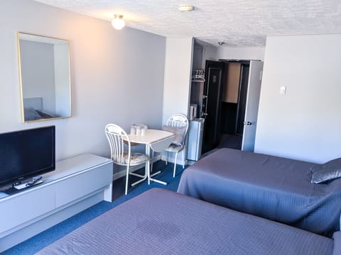 Standard Room, 2 Double Beds | Desk, iron/ironing board, rollaway beds, free WiFi