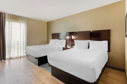 Standard Room, 2 Queen Beds, Non Smoking, Refrigerator | Pillowtop beds, in-room safe, iron/ironing board, free WiFi