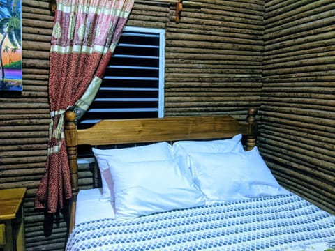 Traditional Cabin, 1 Bedroom, Garden View, Garden Area | 1 bedroom, pillowtop beds, desk, blackout drapes