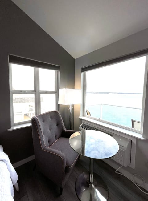 Premium Double Room - 2 Full Beds | Living area | 47-inch flat-screen TV with cable channels, TV