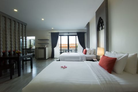 Family Suite | Premium bedding, minibar, in-room safe, individually decorated