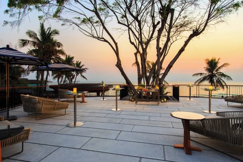 On the beach, sun loungers