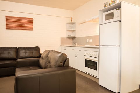 Two Bedroom Apartment | Private kitchen | Fridge, microwave, coffee/tea maker, electric kettle