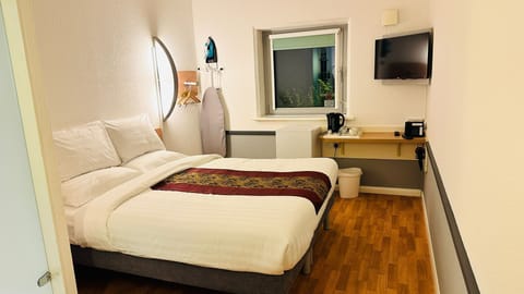 Standard Double Room | Blackout drapes, iron/ironing board, free WiFi, bed sheets