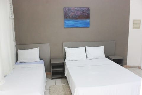 Triple Room | Minibar, iron/ironing board, free WiFi