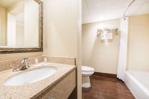 Combined shower/tub, deep soaking tub, free toiletries, hair dryer