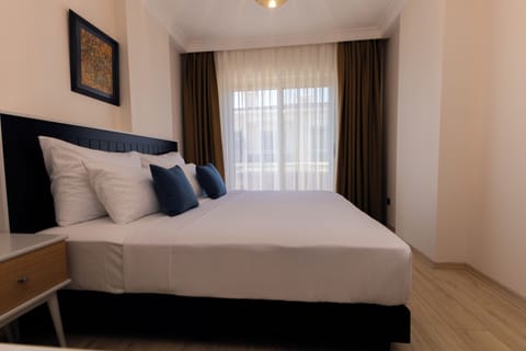 Family Suite, 2 Bedrooms | Premium bedding, minibar, in-room safe, desk