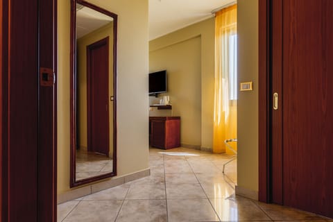 Classic Double Room | Minibar, in-room safe, desk, iron/ironing board