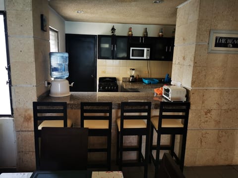 Family Apartment, 3 Bedrooms, Ocean View | Living area | 32-inch flat-screen TV with cable channels, TV, MP3 dock