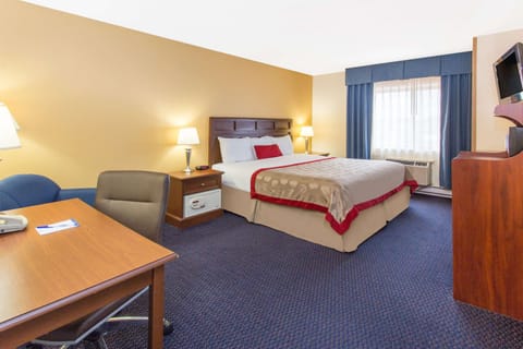 Room, 1 King Bed, Non Smoking | In-room safe, desk, iron/ironing board, free cribs/infant beds