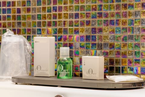 Hair dryer, slippers, towels, soap