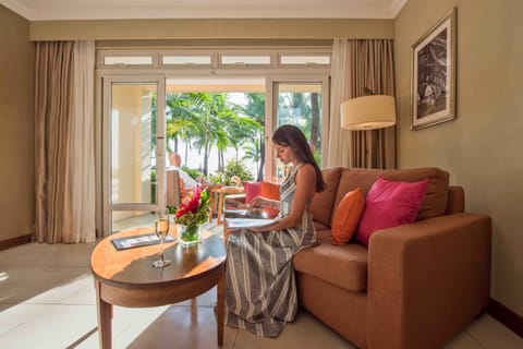 Suite, Beachfront | Minibar, in-room safe, desk, laptop workspace