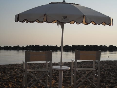 Private beach nearby, white sand, sun loungers, beach umbrellas