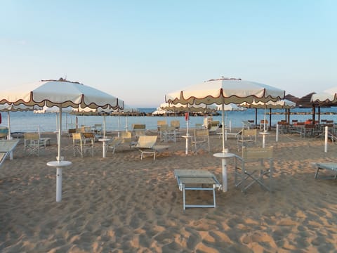 Private beach nearby, white sand, sun loungers, beach umbrellas