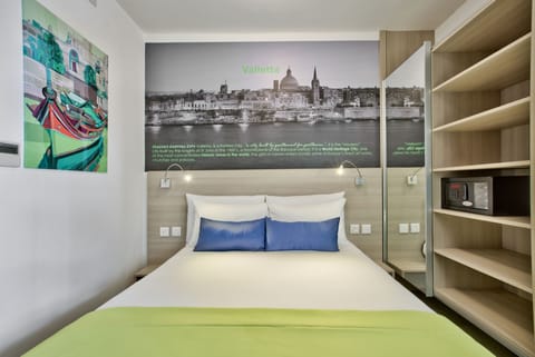 Economy Double or Twin Room | In-room safe, desk, free WiFi, bed sheets