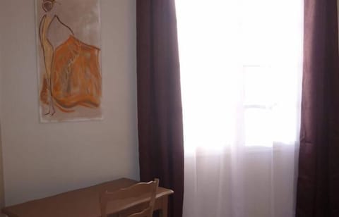 Triple Room | Desk, iron/ironing board, cribs/infant beds, free WiFi