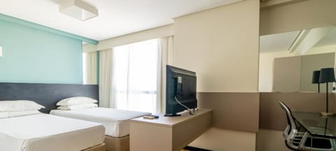 Deluxe Room, 2 Twin Beds | Minibar, in-room safe, individually decorated, individually furnished