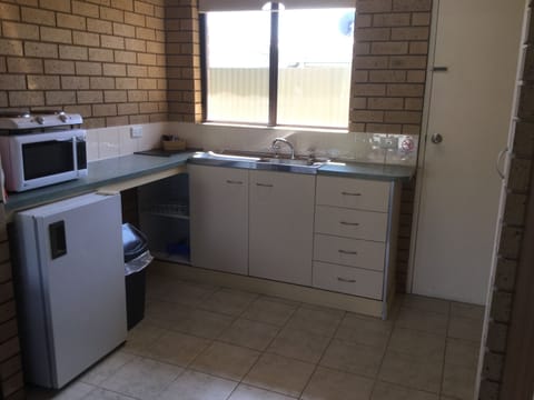 1-bedroom Queen Unit - Double Rate | Private kitchenette | Fridge, microwave, stovetop, coffee/tea maker