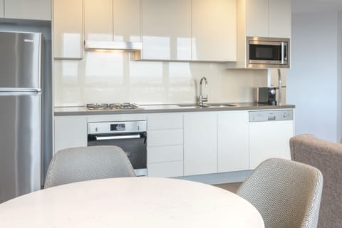 1 Bedroom Luxury Suite | Private kitchen | Full-size fridge, microwave, stovetop, dishwasher