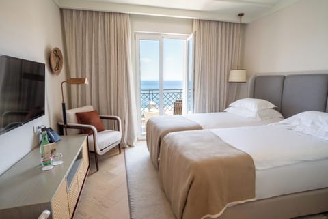 Superior Double/Twin Room Villa Camellia Sea View | Minibar, in-room safe, desk, blackout drapes