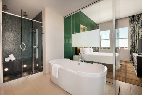 Penthouse, 1 King Bed | Bathroom | Shower, free toiletries, hair dryer, bathrobes