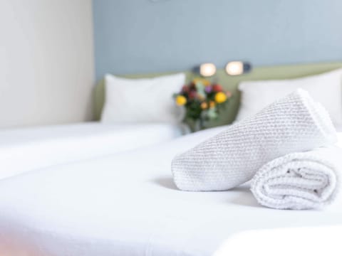 Twin Room, 2 Twin Beds | Free cribs/infant beds, free WiFi, bed sheets