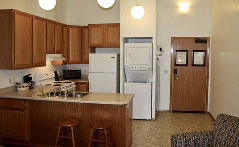 Suite, 2 Queen Beds | Private kitchen | Full-size fridge, microwave, oven, stovetop