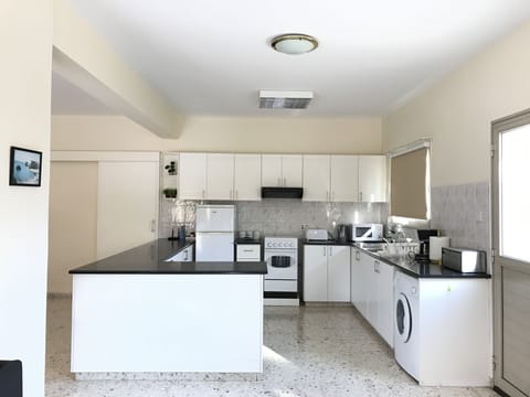 Apartment, 3 Bedrooms, Pool View | Private kitchen | Fridge, microwave, stovetop, coffee/tea maker